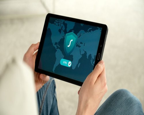 A person practicing secure online account safety on a digital device